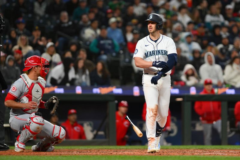 Apr 16, 2024; Seattle, Washington, USA; Seattle Mariners designated hitter Mitch Garver (18) walks with the bases loaded against the Cincinnati Reds during the fifth inning at T-Mobile Park. Mandatory Credit: Steven Bisig-USA TODAY Sports