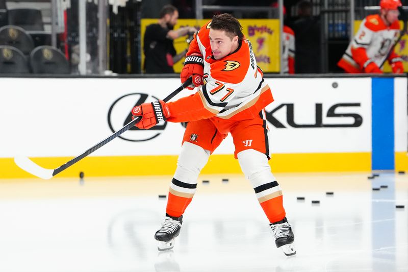 Nov 8, 2025; Las Vegas, Nevada, USA; Anaheim Ducks right wing Frank Vatrano (77) warms up before a game against the Vegas Golden Knights at T-Mobile Arena. Mandatory Credit: Stephen R. Sylvanie-Imagn Images