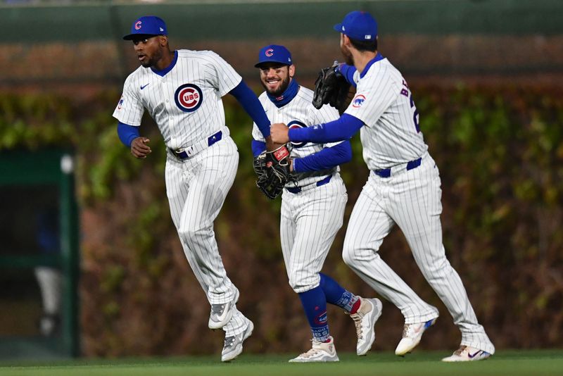 Apr 20, 2024; Chicago, Illinois, USA; The Chicago Cubs celebrate after defeating the Miami Marlins at Wrigley Field. Mandatory Credit: Patrick Gorski-USA TODAY Sports