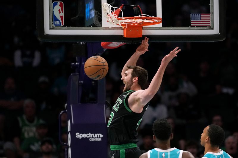 CHARLOTTE, NORTH CAROLINA - NOVEMBER 02: Luke Kornet #40 of the Boston Celtics dunks against the Charlotte Hornets during the first half of the game at Spectrum Center on November 02, 2024 in Charlotte, North Carolina. NOTE TO USER: User expressly acknowledges and agrees that, by downloading and or using this photograph, User is consenting to the terms and conditions of the Getty Images License Agreement. (Photo by Grant Halverson/Getty Images)