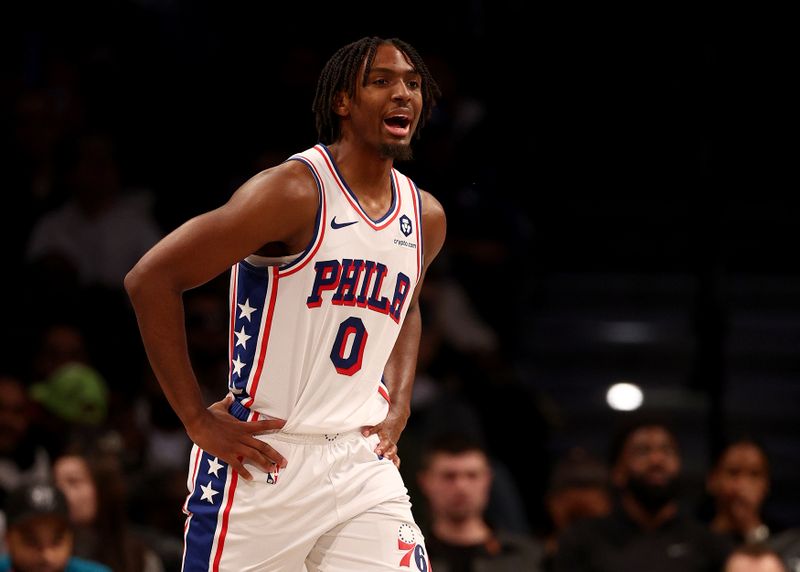 NEW YORK, NEW YORK - NOVEMBER 19:  Tyrese Maxey #0 of the Philadelphia 76ers directs his teammates in the second half against the Brooklyn Nets at Barclays Center on November 19, 2023 in the Brooklyn borough of New York City. The Philadelphia 76ers defeated the Brooklyn Nets 121-99. NOTE TO USER: User expressly acknowledges and agrees that, by downloading and or using this photograph, User is consenting to the terms and conditions of the Getty Images License Agreement. (Photo by Elsa/Getty Images)