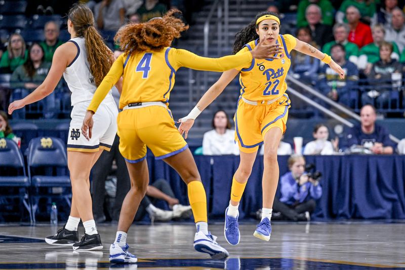 Feb 9, 2023; South Bend, Indiana, USA; Pittsburgh Panthers forward Gabby Hutcherson (22) celebrates with guard Emy Hayford (4) after a basket in the second half against the Notre Dame Fighting Irish at the Purcell Pavilion. Mandatory Credit: Matt Cashore-USA TODAY Sports