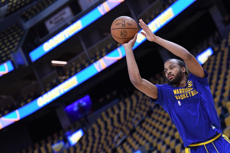 SAN FRANCISCO, CA - MARCH 18: Moses Moody #4 of the Golden State Warriors warms up before the game against the New York Knicks on MARCH 18, 2024 at Chase Center in San Francisco, California. NOTE TO USER: User expressly acknowledges and agrees that, by downloading and or using this photograph, user is consenting to the terms and conditions of Getty Images License Agreement. Mandatory Copyright Notice: Copyright 2024 NBAE (Photo by Noah Graham/NBAE via Getty Images)