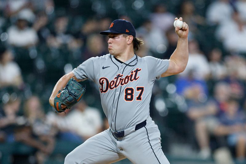 Jun 3, 2025; Chicago, Illinois, USA; Detroit Tigers relief pitcher Tyler Holton (87) delivers a pitch against the Chicago White Sox during the sixth inning at Rate Field. Mandatory Credit: Kamil Krzaczynski-Imagn Images