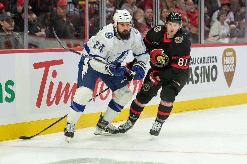 Nov 4, 2023; Ottawa, Ontario, CAN; Tampa Bay Lightning defensemen Zach Bogosian (24) and Ottawa Senators left wing Dominik Kubalik (81) follow the puck in the first period at the Canadian Tire Centre. Mandatory Credit: Marc DesRosiers-USA TODAY Sports