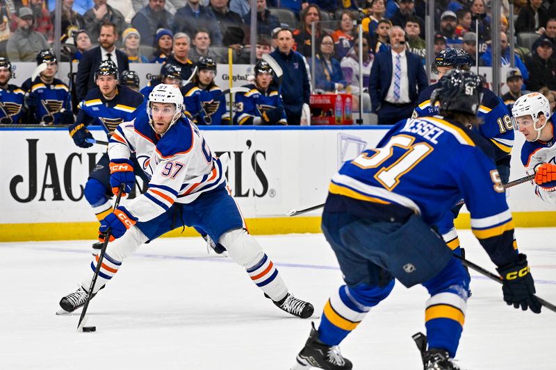 Feb 15, 2024; St. Louis, Missouri, USA;  Edmonton Oilers center Connor McDavid (97) controls the puck against the St. Louis Blues during the first period at Enterprise Center. Mandatory Credit: Jeff Curry-USA TODAY Sports