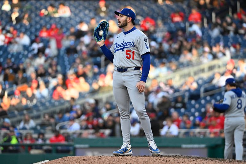 Apr 9, 2025; Washington, District of Columbia, USA; Los Angeles Dodgers pitcher Alex Vesia (51) looks on against the Washington Nationals during the eighth inning at Nationals Park. Mandatory Credit: Brad Mills-Imagn Images