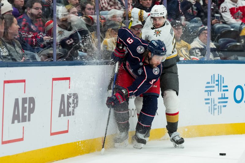 Dec 13, 2025; Columbus, Ohio, USA;  Columbus Blue Jackets defenseman Ivan Provorov (9) skates for the puck against Vegas Golden Knights center Brett Howden (21) in the first period at Nationwide Arena. Mandatory Credit: Aaron Doster-Imagn Images