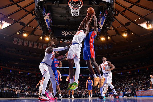 NEW YORK, NY - NOVEMBER 30: Mitchell Robinson #23 of the New York Knicks rebounds the ball during the game against the Detroit Pistons on November 30, 2023 at Madison Square Garden in New York City, New York.  NOTE TO USER: User expressly acknowledges and agrees that, by downloading and or using this photograph, User is consenting to the terms and conditions of the Getty Images License Agreement. Mandatory Copyright Notice: Copyright 2023 NBAE  (Photo by Jesse D. Garrabrant/NBAE via Getty Images)