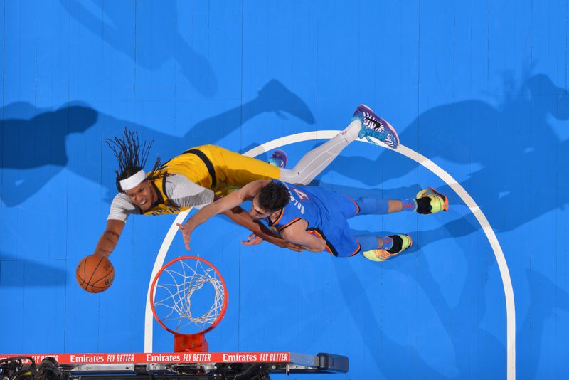 OKLAHOMA CITY, OK - JUNE 8: Myles Turner #33 of the Indiana Pacers drives to the basket during the game against the Oklahoma City Thunder  during Game Two of the 2025 NBA Finals on June 8, 2025 at Paycom Center in Oklahoma City, Oklahoma. NOTE TO USER: User expressly acknowledges and agrees that, by downloading and or using this photograph, User is consenting to the terms and conditions of the Getty Images License Agreement. Mandatory Copyright Notice: Copyright 2025 NBAE (Photo by Jesse D. Garrabrant/NBAE via Getty Images)
