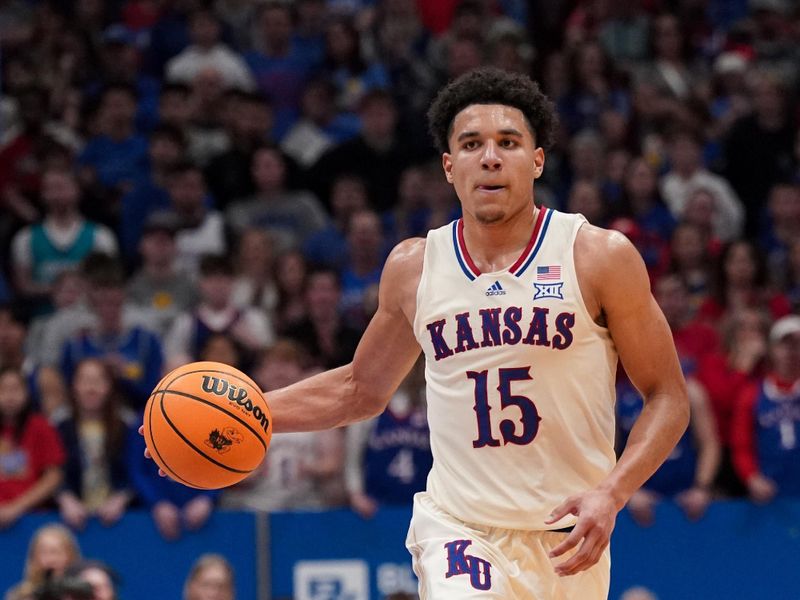 Dec 22, 2023; Lawrence, Kansas, USA; Kansas Jayhawks guard Kevin McCullar Jr. (15) dribbles the ball downcourt against the Yale Bulldogs during the second half at Allen Fieldhouse. Mandatory Credit: Denny Medley-USA TODAY Sports