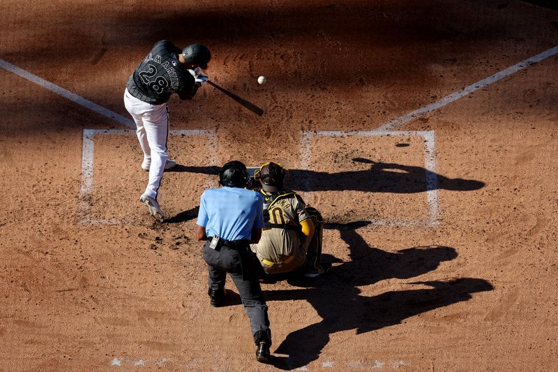 Jun 15, 2024; New York City, New York, USA; New York Mets designated hitter J.D. Martinez (28) hits a two run home run against the San Diego Padres during the fourth inning at Citi Field. Mandatory Credit: Brad Penner-USA TODAY Sports