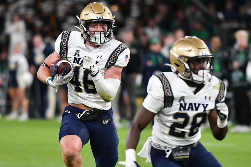 Aug 26, 2023; Dublin, IRL; Navy Midshipmen fullback Alex Tecza runs the ball in the first half against the Notre Dame Fighting Irish at Aviva Stadium. Mandatory Credit: Matt Cashore-USA TODAY Sports