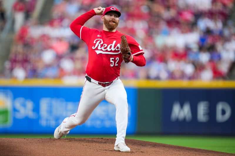 Sep 20, 2025; Cincinnati, Ohio, USA; Cincinnati Reds pitcher Zack Littell (52) throws against the Chicago Cubs in the first inning at Great American Ball Park. Mandatory Credit: Aaron Doster-Imagn Images