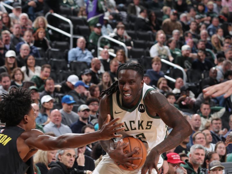 MILWAUKEE, WI - NOVEMBER 7: Taurean Prince #12 of the Milwaukee Bucks drives to the basket during the game against the Utah Jazz on November 7, 2024 at Fiserv Forum Center in Milwaukee, Wisconsin. NOTE TO USER: User expressly acknowledges and agrees that, by downloading and or using this Photograph, user is consenting to the terms and conditions of the Getty Images License Agreement. Mandatory Copyright Notice: Copyright 2024 NBAE (Photo by Gary Dineen/NBAE via Getty Images).