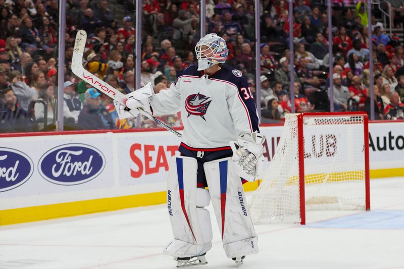 Nov 6, 2023; Sunrise, Florida, USA; Columbus Blue Jackets goaltender Spencer Martin (30) reacts after a goal by left wing Kirill Marchenko (not pictured) against the Florida Panthers during the second period at Amerant Bank Arena. Mandatory Credit: Sam Navarro-USA TODAY Sports