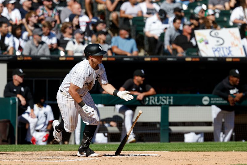 Sep 26, 2024; Chicago, Illinois, USA; Chicago White Sox first baseman Andrew Vaughn (25) hits a two-run single against the Los Angeles Angels during the fifth inning at Guaranteed Rate Field. Mandatory Credit: Kamil Krzaczynski-Imagn Images