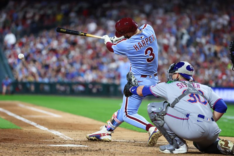 Sep 11, 2025; Philadelphia, Pennsylvania, USA; Philadelphia Phillies first base Bryce Harper (3) hits an RBI single against the New York Mets during the sixth inning at Citizens Bank Park. Mandatory Credit: Bill Streicher-Imagn Images