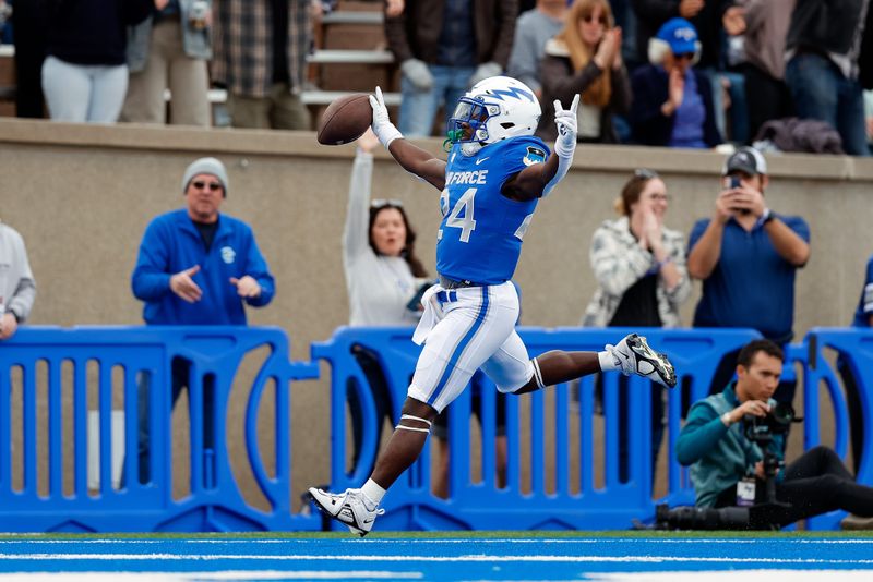 Nov 18, 2023; Colorado Springs, Colorado, USA; Air Force Falcons running back John Lee Eldridge III (24) runs for a touchdown in the first quarter against the UNLV Rebels at Falcon Stadium. Mandatory Credit: Isaiah J. Downing-USA TODAY Sports