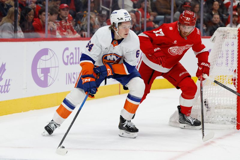 Nov 20, 2025; Detroit, Michigan, USA;  New York Islanders center Calum Ritchie (64) skates with the puck defended by Detroit Red Wings left wing J.T. Compher (37) in the first period at Little Caesars Arena. Mandatory Credit: Rick Osentoski-Imagn Images