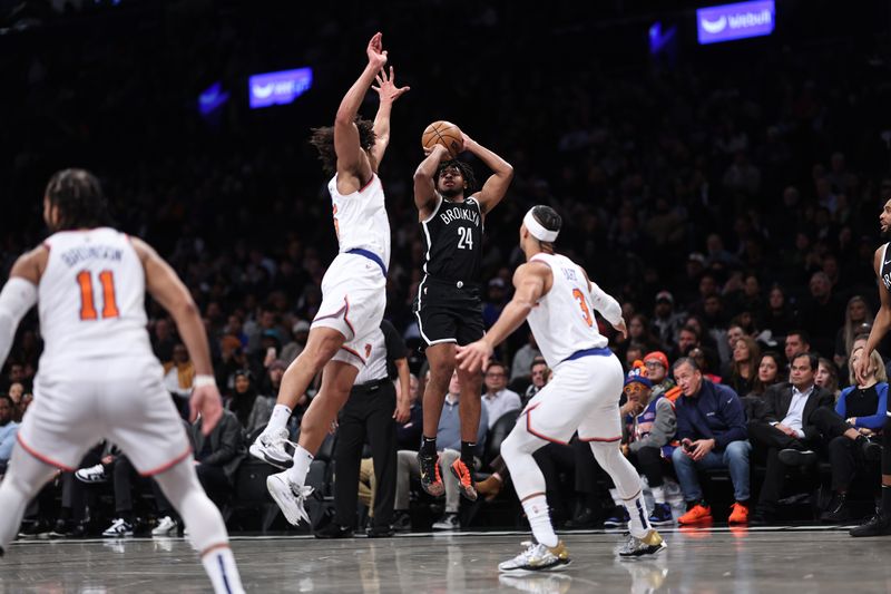 NEW YORK, NEW YORK - JANUARY 23: Cam Thomas #24 of the Brooklyn Nets attempts a three pointer during the first quarter of the game against the New York Knicks at Barclays Center on January 23, 2024 in the Brooklyn borough of New York City.  NOTE TO USER: User expressly acknowledges and agrees that, by downloading and or using this photograph, User is consenting to the terms and conditions of the Getty Images License Agreement. (Photo by Dustin Satloff/Getty Images)