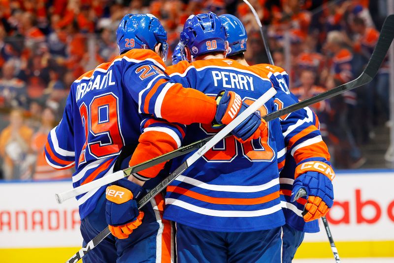 Apr 27, 2025; Edmonton, Alberta, CAN; The Edmonton Oilers celebrate a goal scored by defensemen Evan Bouchard (2) during the third period against the Los Angeles Kings in game four of the first round of the 2025 Stanley Cup Playoffs at Rogers Place. Mandatory Credit: Perry Nelson-Imagn Images