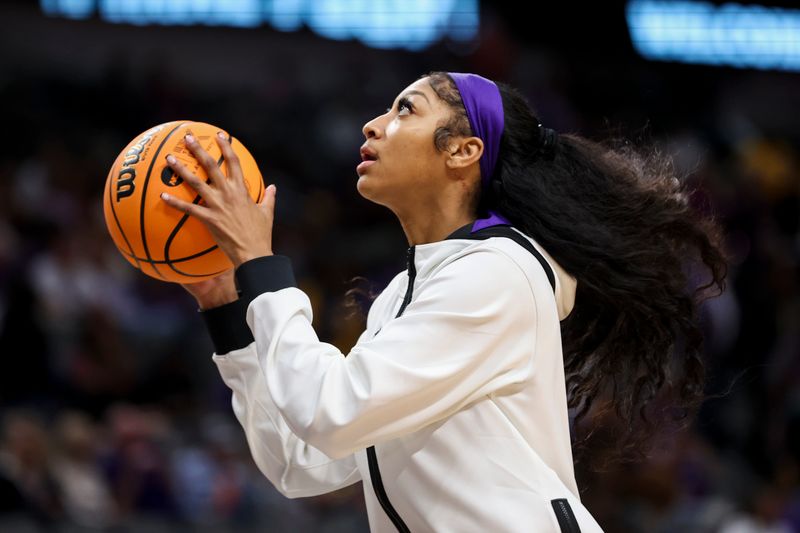 Mar 31, 2023; Dallas, TX, USA; LSU Lady Tigers forward Angel Reese (10) shoots during warmups prior to the game against the Virginia Tech Hokies in semifinals of the the women's Final Four of the 2023 NCAA Tournament at American Airlines Center. Mandatory Credit: Kevin Jairaj-USA TODAY Sports