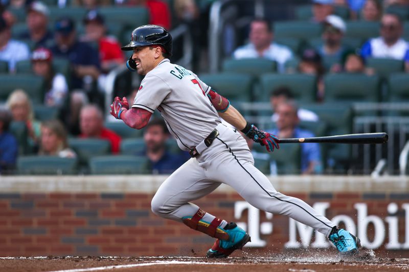 Jun 3, 2025; Atlanta, Georgia, USA; Arizona Diamondbacks right fielder Corbin Carroll (7) hits a single against the Atlanta Braves in the third inning at Truist Park. Mandatory Credit: Brett Davis-Imagn Images