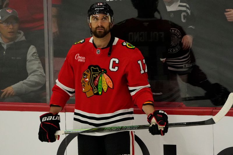 Nov 27, 2024; Chicago, Illinois, USA; Chicago Blackhawks left wing Nick Foligno (17) warms up before a game against the Dallas Stars at United Center. Mandatory Credit: David Banks-Imagn Images