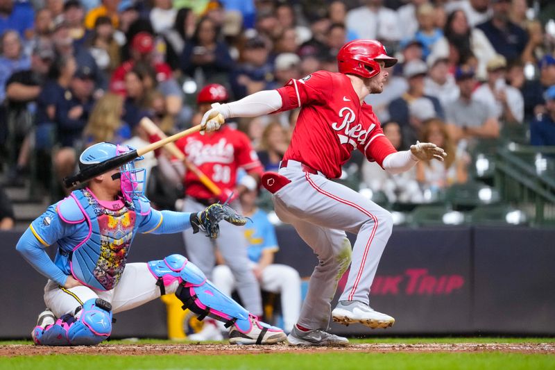 Sep 26, 2025; Milwaukee, Wisconsin, USA;  Cincinnati Reds left fielder Gavin Lux (2) hits a double during the sixth inning against the Milwaukee Brewers at American Family Field. Mandatory Credit: Jeff Hanisch-Imagn Images