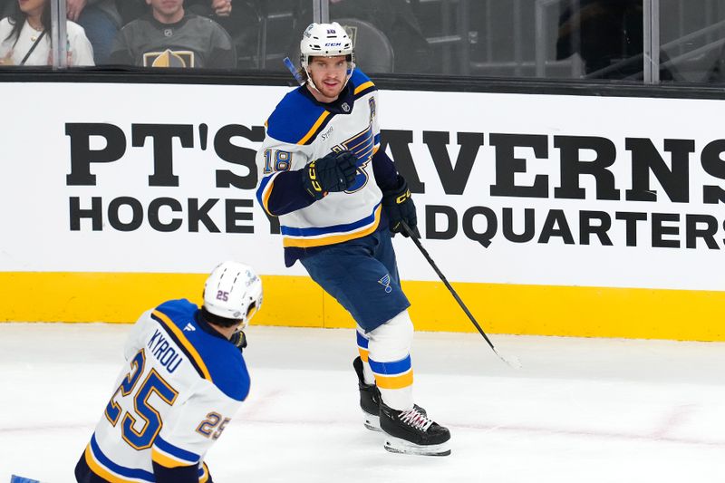 Oct 11, 2024; Las Vegas, Nevada, USA; St. Louis Blues center Robert Thomas (18) celebrates after scoring a goal against the Vegas Golden Knights during the third period at T-Mobile Arena. Mandatory Credit: Stephen R. Sylvanie-Imagn Images