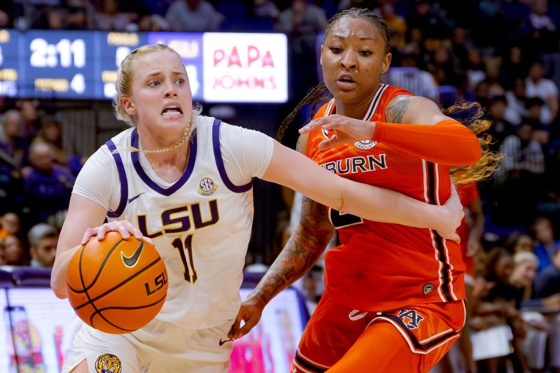 Feb 22, 2024; Baton Rouge, Louisiana, USA; LSU Lady Tigers guard Hailey Van Lith (11) dribbles to the basket against Auburn Tigers guard JaMya Mingo-Young (2) during the second half at Pete Maravich Assembly Center. Mandatory Credit: Matthew Hinton-USA TODAY Sports