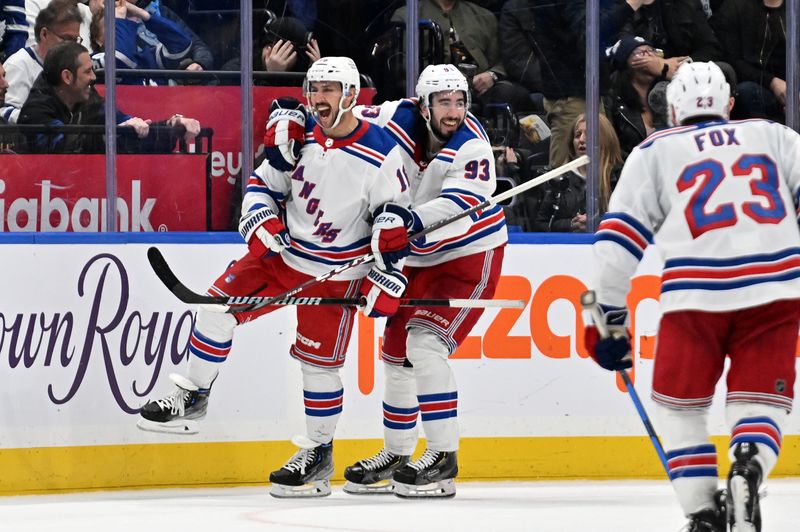 Mar 2, 2024; Toronto, Ontario, CAN;  New York Rangers forward Vincent Trochek (16) celebrates with forward Mika Zibanejadl (93) after scoring against the Toronto Maple Leafs in the third period at Scotiabank Arena. Mandatory Credit: Dan Hamilton-USA TODAY Sports