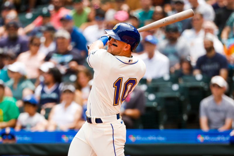 Jul 16, 2023; Seattle, Washington, USA; Seattle Mariners left fielder Jarred Kelenic (10) hits an RBI-double against the Detroit Tigers during the first inning at T-Mobile Park. Mandatory Credit: Joe Nicholson-USA TODAY Sports