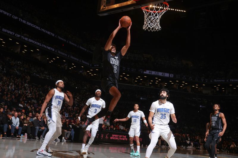 BROOKLYN, NY - NOVEMBER 29: Cameron Johnson #2 of the Brooklyn Nets dunks the ball during the game against the Orlando Magic during a Emirates NBA Cup game on October 22, 2024 at Barclays Center in Brooklyn, New York. NOTE TO USER: User expressly acknowledges and agrees that, by downloading and or using this Photograph, user is consenting to the terms and conditions of the Getty Images License Agreement. Mandatory Copyright Notice: Copyright 2024 NBAE (Photo by Nathaniel S. Butler/NBAE via Getty Images)