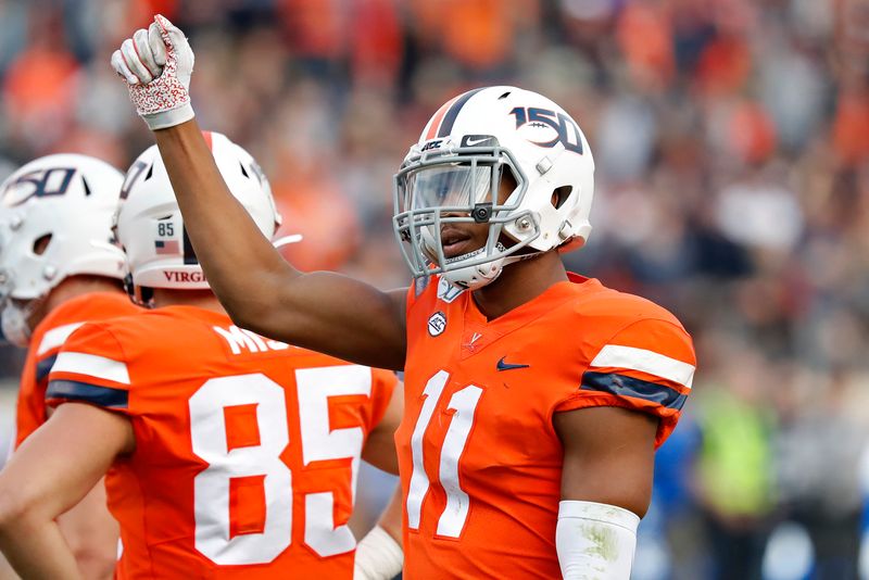 Oct 19, 2019; Charlottesville, VA, USA; Virginia Cavaliers linebacker Charles Snowden (11) celebrates on the field against the Duke Blue Devils in the third quarter at Scott Stadium. Mandatory Credit: Geoff Burke-USA TODAY Sports