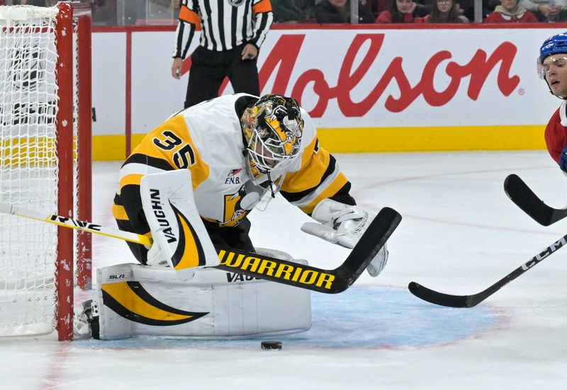 Oct 14, 2024; Montreal, Quebec, CAN; Pittsburgh Penguins goalie Tristan Jarry (35) makes a save against the Montreal Canadiens during the second period at the Bell Centre. Mandatory Credit: Eric Bolte-Imagn Images