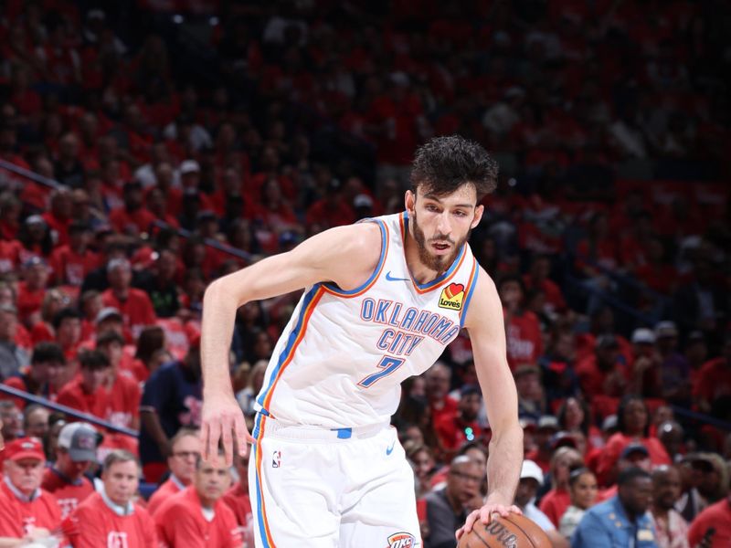 NEW ORLEANS, LA - APRIL 27:  Chet Holmgren #7 of the Oklahoma City Thunder handles the ball during the game against the New Orleans Pelicans during Round 1 Game 3 of the 2024 NBA Playoffs on April 27, 2024 at the Smoothie King Center in New Orleans, Louisiana. NOTE TO USER: User expressly acknowledges and agrees that, by downloading and or using this Photograph, user is consenting to the terms and conditions of the Getty Images License Agreement. Mandatory Copyright Notice: Copyright 2024 NBAE (Photo by Jeff Haynes/NBAE via Getty Images)