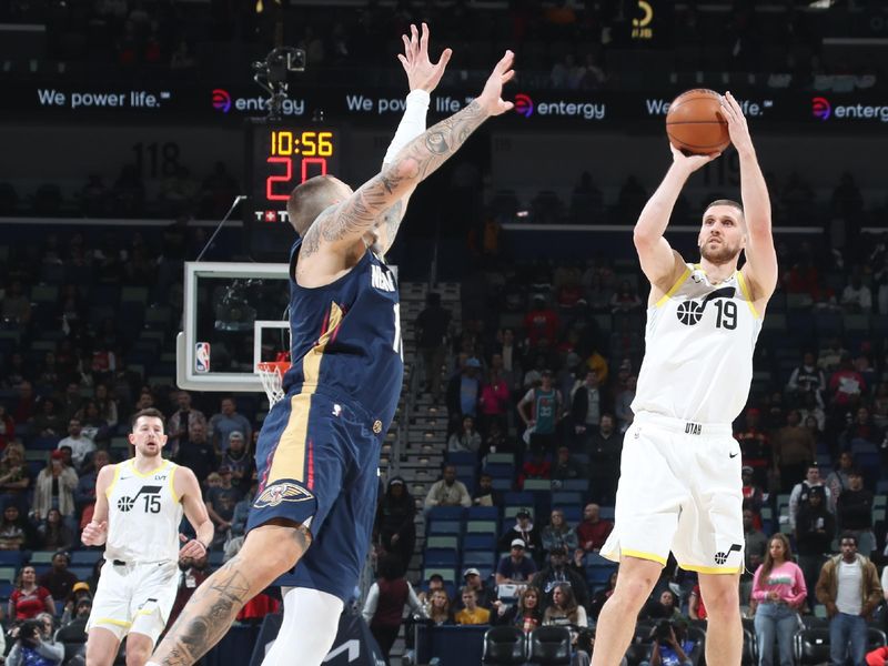 NEW ORLEANS, LA - JANUARY 17:  Svi Mykhailiuk #19 of the Utah Jazz shoots a three point basket during the game against the New Orleans Pelicans on January 17, 2025 at the Smoothie King Center in New Orleans, Louisiana. NOTE TO USER: User expressly acknowledges and agrees that, by downloading and or using this Photograph, user is consenting to the terms and conditions of the Getty Images License Agreement. Mandatory Copyright Notice: Copyright 2025 NBAE (Photo by Layne Murdoch Jr./NBAE via Getty Images)