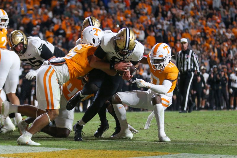 Nov 25, 2023; Knoxville, Tennessee, USA; Vanderbilt Commodores quarterback Ken Seals (8) runs the ball for a touchdown against the Tennessee Volunteers during the second half at Neyland Stadium. Mandatory Credit: Randy Sartin-USA TODAY Sports