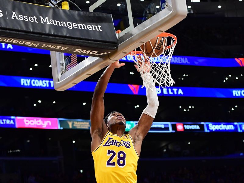 LOS ANGELES, CA - FEBRUARY 29: Rui Hachimura #28 of the Los Angeles Lakers dunks the ball during the game against the Los Angeles Lakers on February 29, 2024 at Crypto.Com Arena in Los Angeles, California. NOTE TO USER: User expressly acknowledges and agrees that, by downloading and/or using this Photograph, user is consenting to the terms and conditions of the Getty Images License Agreement. Mandatory Copyright Notice: Copyright 2024 NBAE (Photo by Adam Pantozzi/NBAE via Getty Images)