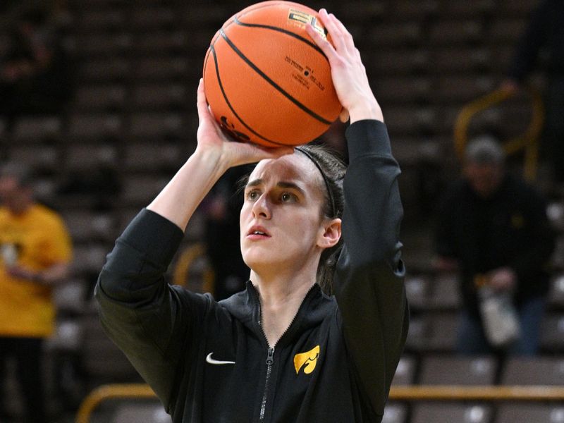 Feb 15, 2024; Iowa City, Iowa, USA; Iowa Hawkeyes guard Caitlin Clark (22) warms up before the game against the Michigan Wolverines at Carver-Hawkeye Arena. Mandatory Credit: Jeffrey Becker-USA TODAY Sports