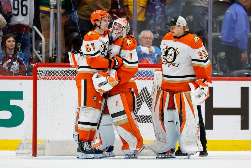 Jan 21, 2026; Denver, Colorado, USA; Anaheim Ducks left wing Cutter Gauthier (61) celebrates with goaltender Lukas Dostal (1) and goaltender Ville Husso (33) after the game against the Colorado Avalanche at Ball Arena. Mandatory Credit: Isaiah J. Downing-Imagn Images