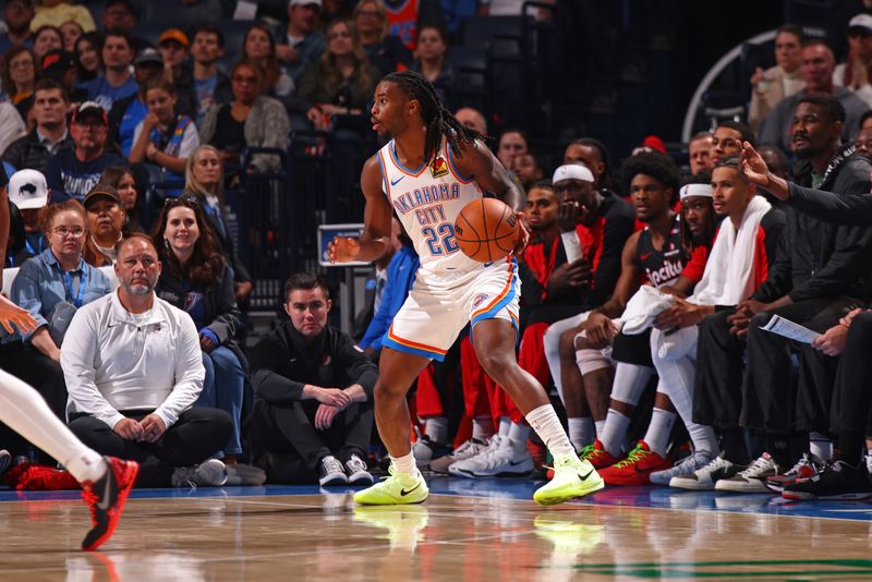 OKLAHOMA CITY, OK - NOVEMBER 20: Cason Wallace #22 of the Oklahoma City Thunder dribbles the ball during the game against the Portland Trail Blazers on November 20, 2024 at Paycom Center in Oklahoma City, Oklahoma. NOTE TO USER: User expressly acknowledges and agrees that, by downloading and or using this photograph, User is consenting to the terms and conditions of the Getty Images License Agreement. Mandatory Copyright Notice: Copyright 2024 NBAE (Photo by Zach Beeker/NBAE via Getty Images)