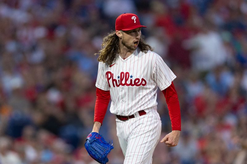 Aug 5, 2023; Philadelphia, Pennsylvania, USA; Philadelphia Phillies relief pitcher Matt Strahm (25) reacts after a Kansas City Royals strikeout to end the seventh inning at Citizens Bank Park. Mandatory Credit: Bill Streicher-USA TODAY Sports