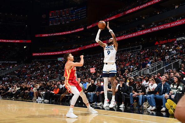 ATLANTA, GA - OCTOBER 30: Nickeil Alexander-Walker #9 of the Minnesota Timberwolves shoots a three point basket against the Atlanta Hawks on October 30, 2023 at State Farm Arena in Atlanta, Georgia.  NOTE TO USER: User expressly acknowledges and agrees that, by downloading and/or using this Photograph, user is consenting to the terms and conditions of the Getty Images License Agreement. Mandatory Copyright Notice: Copyright 2023 NBAE (Photo by Scott Cunningham/NBAE via Getty Images)