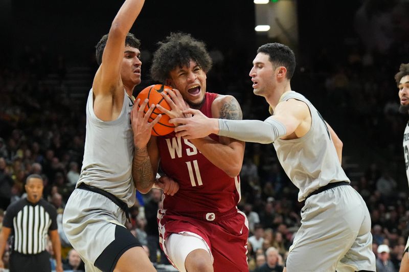 Jan 22, 2023; Boulder, Colorado, USA; Washington State Cougars forward DJ Rodman (11) drives between Colorado Buffaloes forward Tristan da Silva (23) and guard Luke O'Brien (0) in the second half at the CU Events Center. Mandatory Credit: Ron Chenoy-USA TODAY Sports