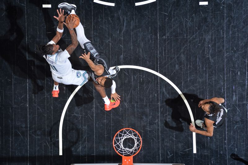 SAN ANTONIO, TX - JANUARY 27: Naz Reid #11 of the Minnesota Timberwolves passes the ball during the game against the San Antonio Spurs on January 27, 2024 at the Frost Bank Center in San Antonio, Texas. NOTE TO USER: User expressly acknowledges and agrees that, by downloading and or using this photograph, user is consenting to the terms and conditions of the Getty Images License Agreement. Mandatory Copyright Notice: Copyright 2024 NBAE (Photos by Michael Gonzales/NBAE via Getty Images)