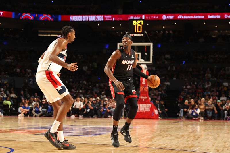 MEXICO CITY, MX - NOVEMBER 2: Bam Adebayo #13 of the Miami Heat looks on during the game against the Washington Wizards as part of 2024 NBA Mexico Games on November 2, 2024 in Mexico City, Mexico at Arena Ciudad de Mexico. NOTE TO USER: User expressly acknowledges and agrees that, by downloading and or using this photograph, User is consenting to the terms and conditions of the Getty Images License Agreement. Mandatory Copyright Notice: Copyright 2024 NBAE (Photo by Stephen Gosling/NBAE via Getty Images)