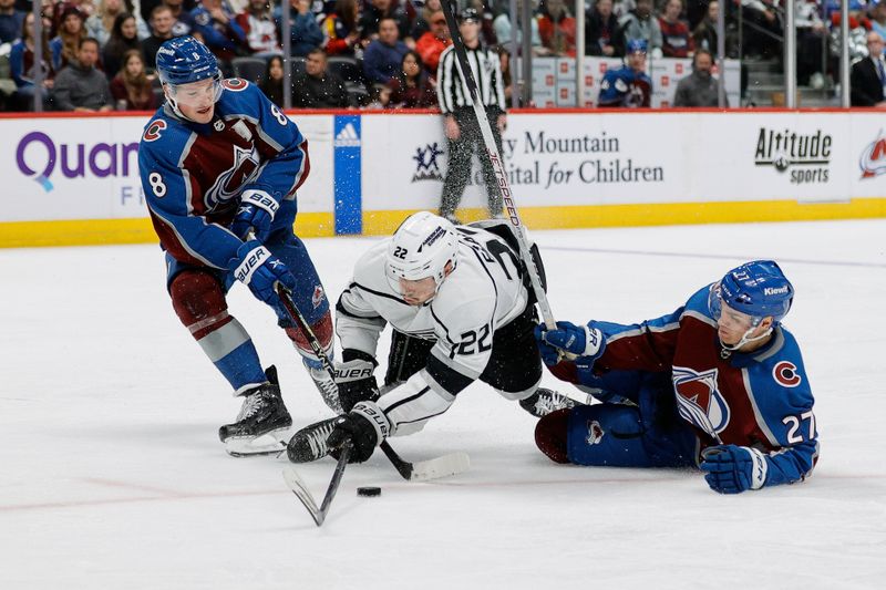 Jan 26, 2024; Denver, Colorado, USA; Los Angeles Kings left wing Kevin Fiala (22) gets tripped up with Colorado Avalanche left wing Jonathan Drouin (27) and defenseman Cale Makar (8) in the third period at Ball Arena. Mandatory Credit: Isaiah J. Downing-USA TODAY Sports